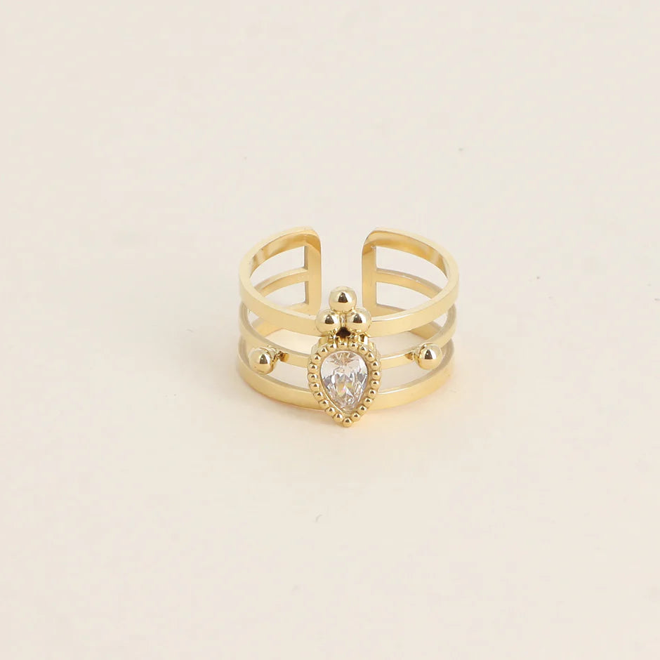 Bague Milan – Triple Anneau Doré & Cristal Goutte