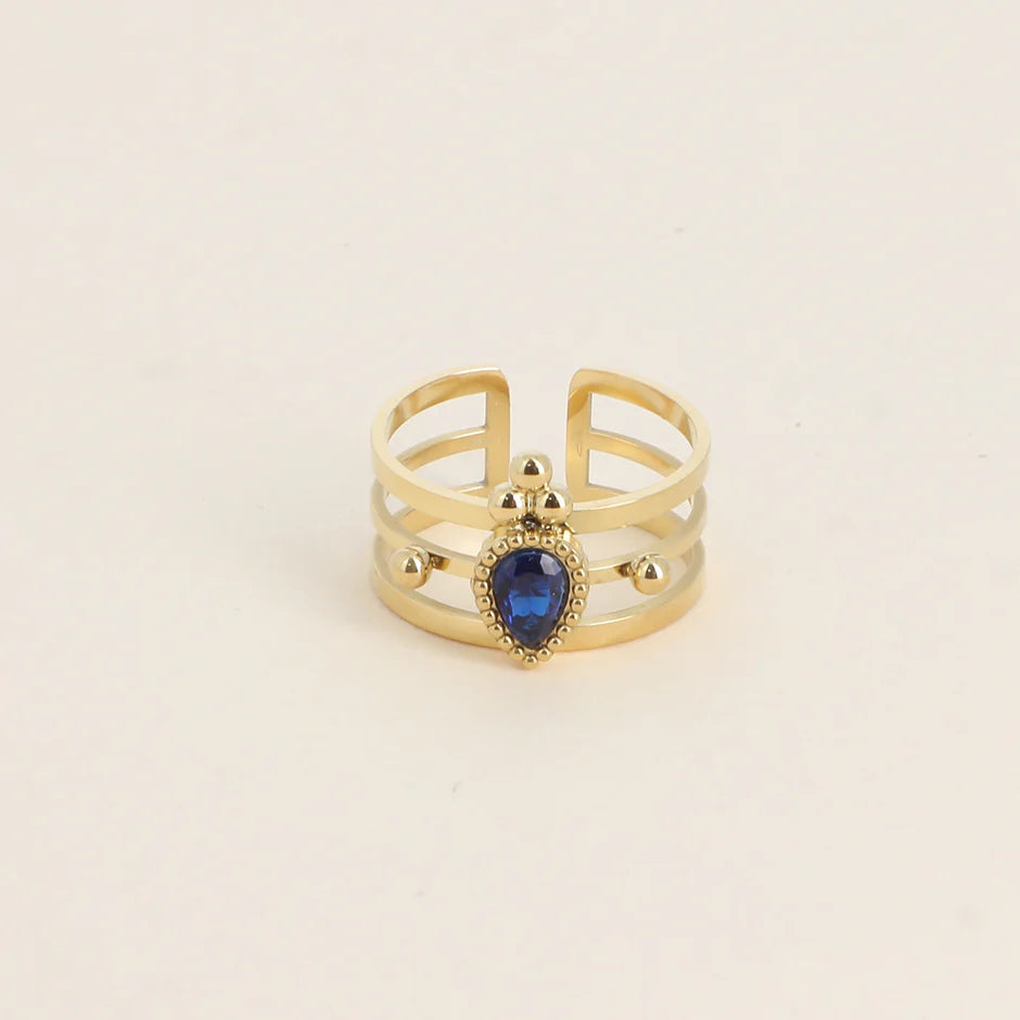 Bague Milan – Triple Anneau Doré & Cristal Goutte