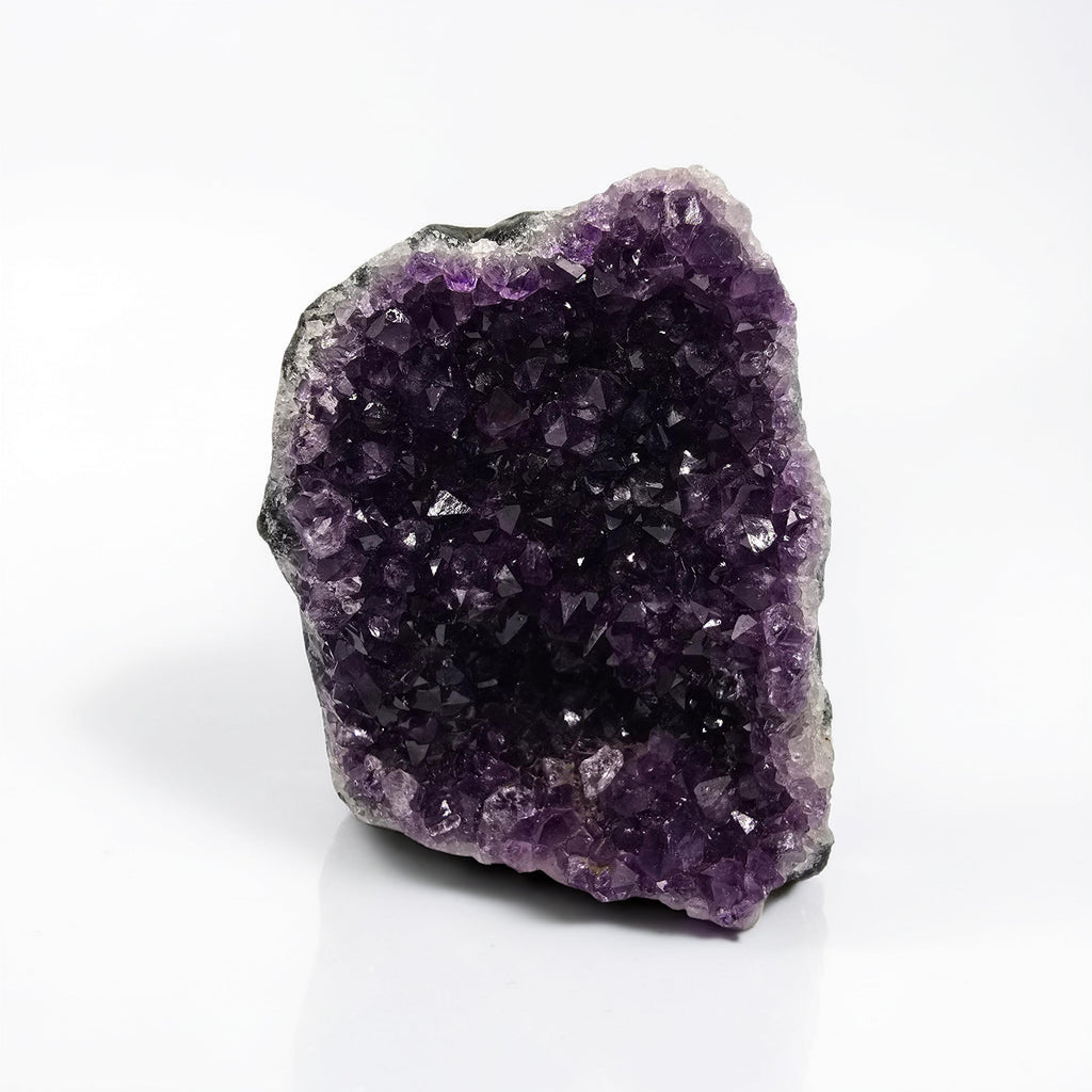 Géode Améthyste brute d'Uruguay 300-750g. Violet profond et intense. Protection spirituelle, purification, méditation. Pièce unique exceptionnelle.
